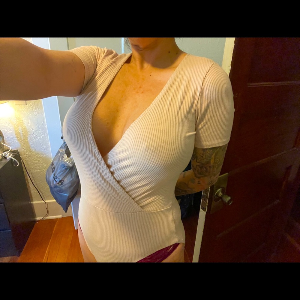 Bodysuit. A light blush color. Worn once.